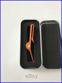 Scotty Cameron Gallery Wave Vibes Orange/Silver Clip Pivot Tool