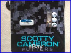 Scotty Cameron Newport (have one that can use a towel, balls and divot tool)